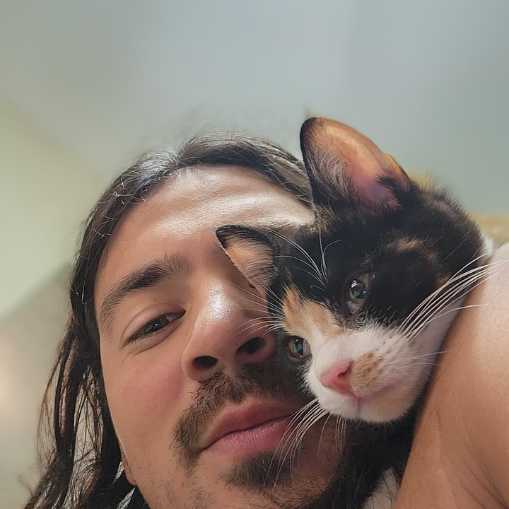 RoyDan with a calico kitten